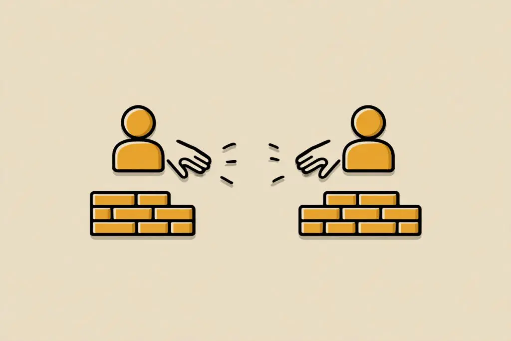 Hands building a brick wall between two profiles a guide for the FAQ on how to block someone on Hinge