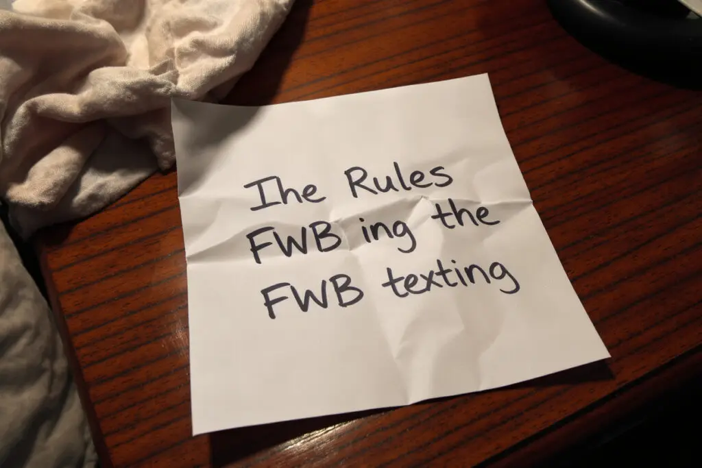 a crumpled ambiguous note on a bedside table symbolizing the casual nature implied by fwb texting rules