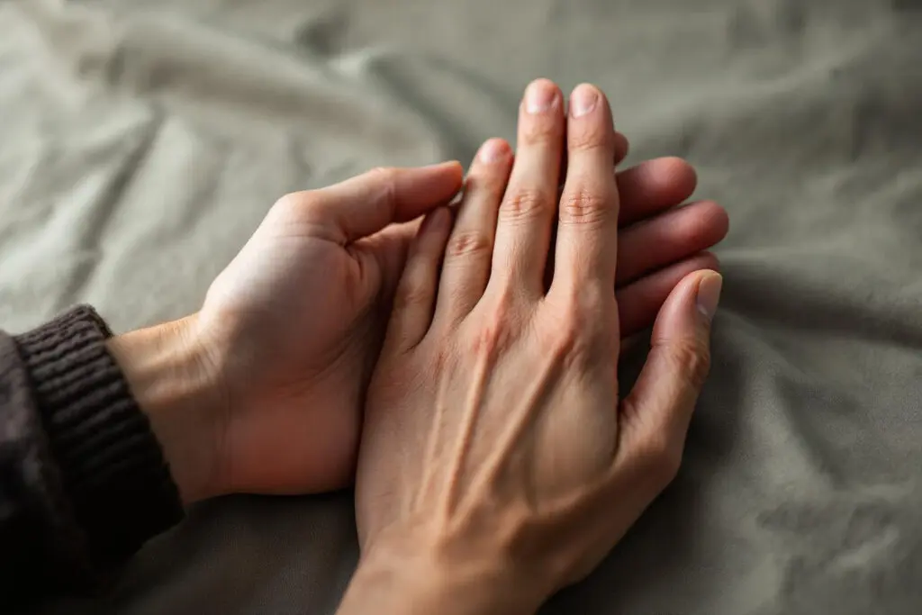 two hands intimately intertwined and exploring palm lines symbolizing deep connection and the nuances of do women care about body count - Dating Man Secrets - Psychology Attraction Tips Revealed two hands intimately intertwined and exploring palm lines symbolizing deep connection and the nuances of do women care about body count