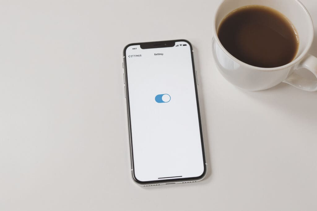a simple toggle switch in the off position on a phone screen illustrating how to cancel bumble premium